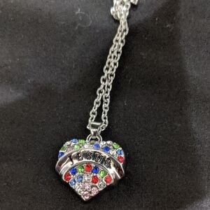 Silver Toned Jesus Heart Pendant Necklace with Multicolor Stones